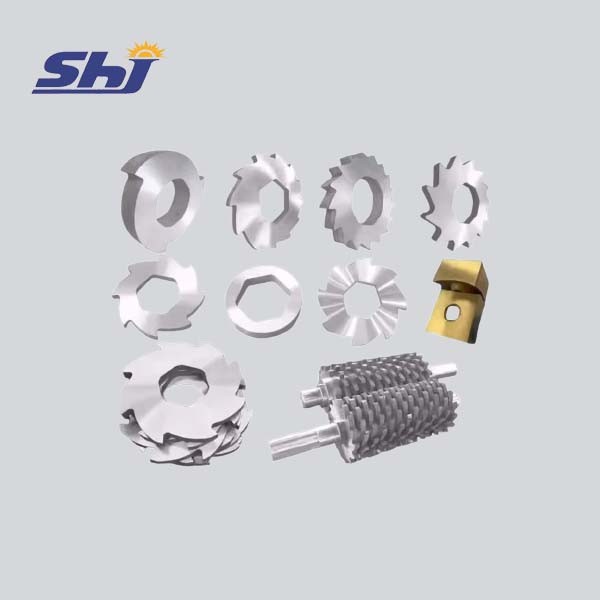 Wear-resistant shredder blades for mixed scrap processing